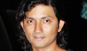 Kunder proud of assistant Karan Malhotra