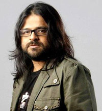 Pritam to compose for Dhoom 3  