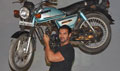 John Abraham lifts a bike at Force Promotions - Force Event Photos