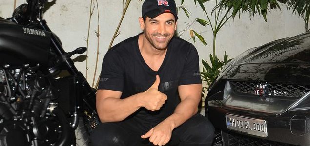 John Abraham snapped with his favorite bike and car
