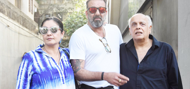 Sanjay Dutt snapped making a style statement with reflector shades with Mahesh Bhatt and Pooja Bhatt after a meeting at Vishesh Film's office