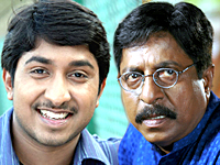 Sreenivasan and Vineeth Sreenivasan in Traffic