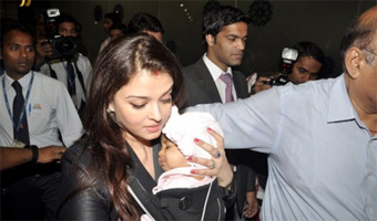 Aishwarya shields Aaradhya from media