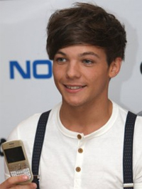 Tomlinson buys football team