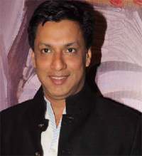 Bhandarkar unhappy with bar on A films on TV