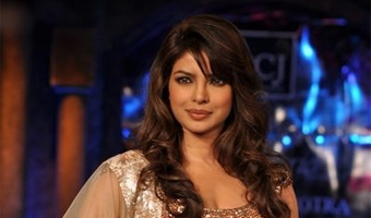 Priyanka to miss her songs release for Barfi! sake