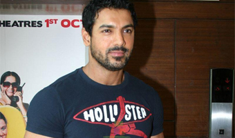John Abraham helps spread light