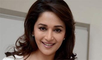 KJO calls Madhuri mother of entertaining songs