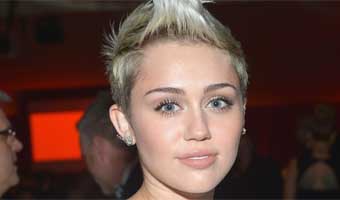 Miley reveals she tops Maxims Hot 100 list