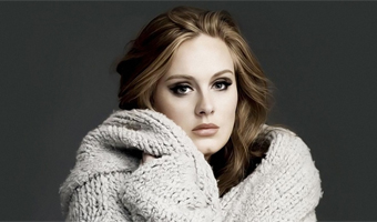 Adele receives MBE honour