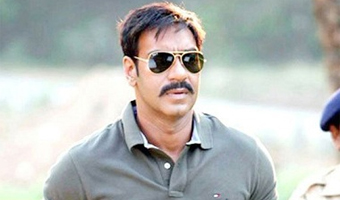 What prevented Ajay Devgun from attending Singam 2 audio launch? 