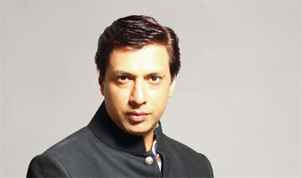 I want to make a simple love story with music: Bhandarkar