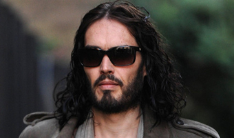 Russell Brand turns yoga teacher