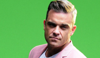 Robbie Williams signs fans bottom