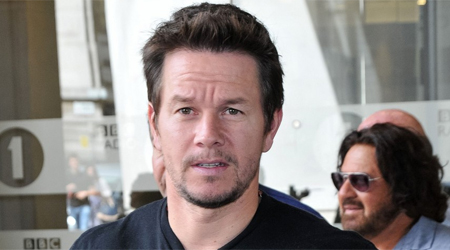 Why does Mark Wahlberg want to punch Harry Styles?