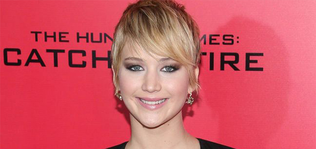 Jennifer Lawrence thronged by mob of fans while promoting The Hunger Games