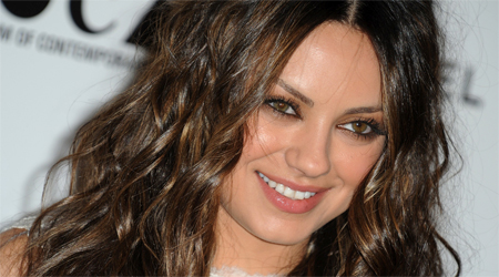 Mila Kunis attends Ashton Kutchers brothers wedding