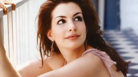 When parrot perched on Anne Hathaways head