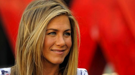 Aniston stocks up clothes, make up
