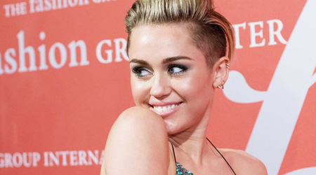 Cyrus defends use of short people