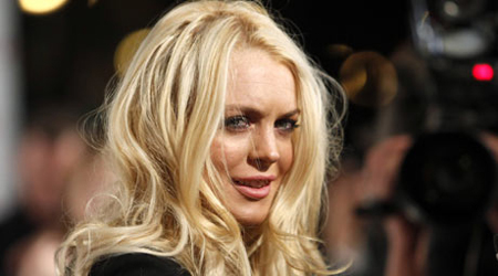 Lohan settles dispute with clothing firm
