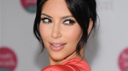 Kim flies with 12 bags to wedding destination