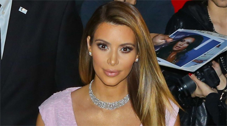 Kim Kardashian enjoys diet wedding cake