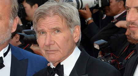 Injured Harrison Ford back on feet