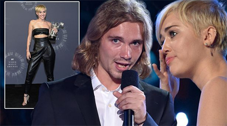 Cyrus takes homeless guy as her date at MTV VMAs