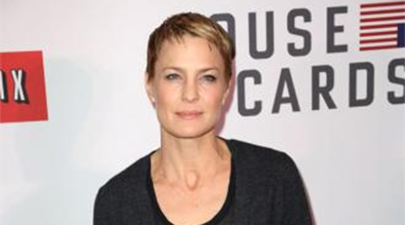 Robin Wright wishes to again watch sons grow up