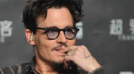 Johnny Depp performs with Aerosmith