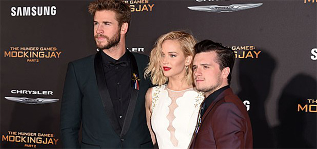 Hunger Games cast observes moment of silence for Paris attack victims at premiere