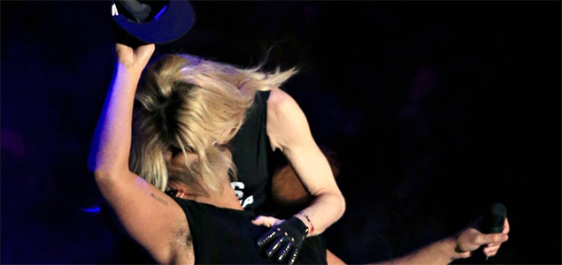 Madonna plants a surprise kiss on Drake in the middle of his stage performance