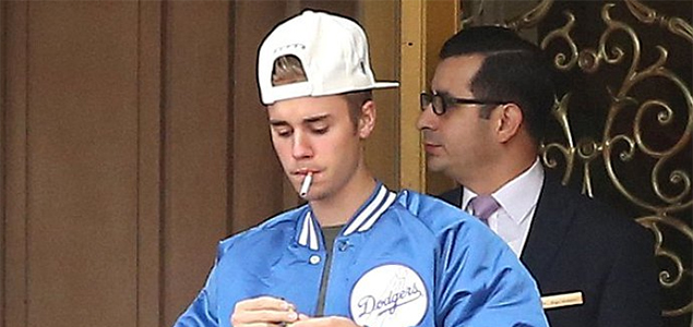 Justin Bieber caught smoking again