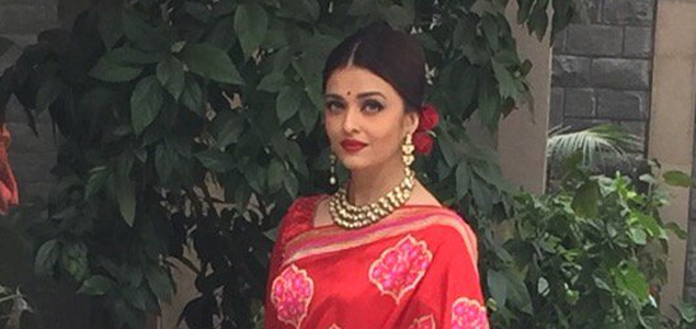 Aishwarya looks ravishing in red sari for Hollande lunch