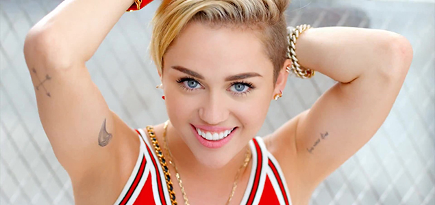 Take a look at my swervy breast: Miley Cyrus