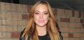 Lindsay Lohan gets cosy with mystery man